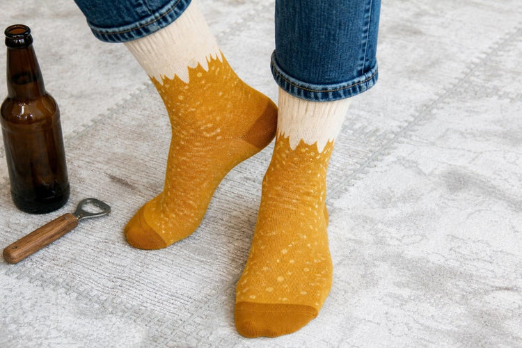 Golden Pint beer socks that look like a pint of lager